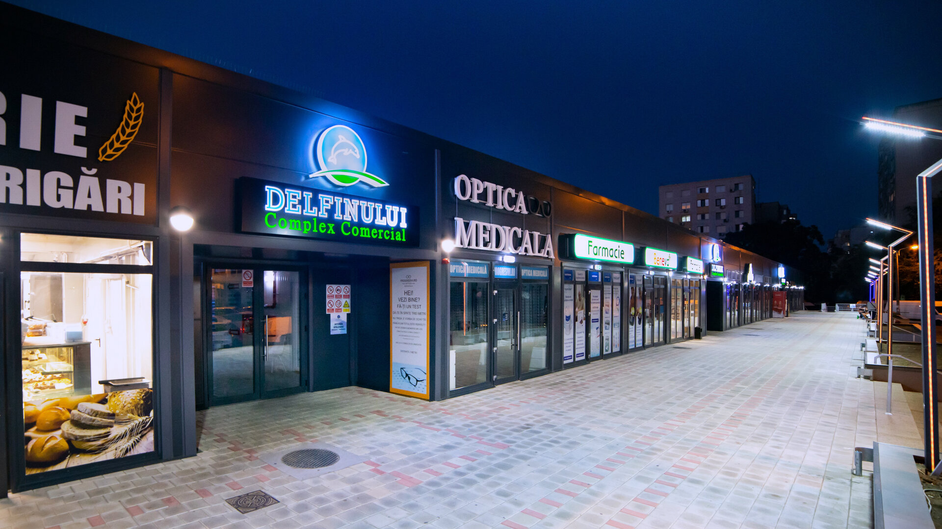 The Delfinului Market: Modernization, interior reconfiguration, expansion, façade remodeling, and structural steel reinforcement